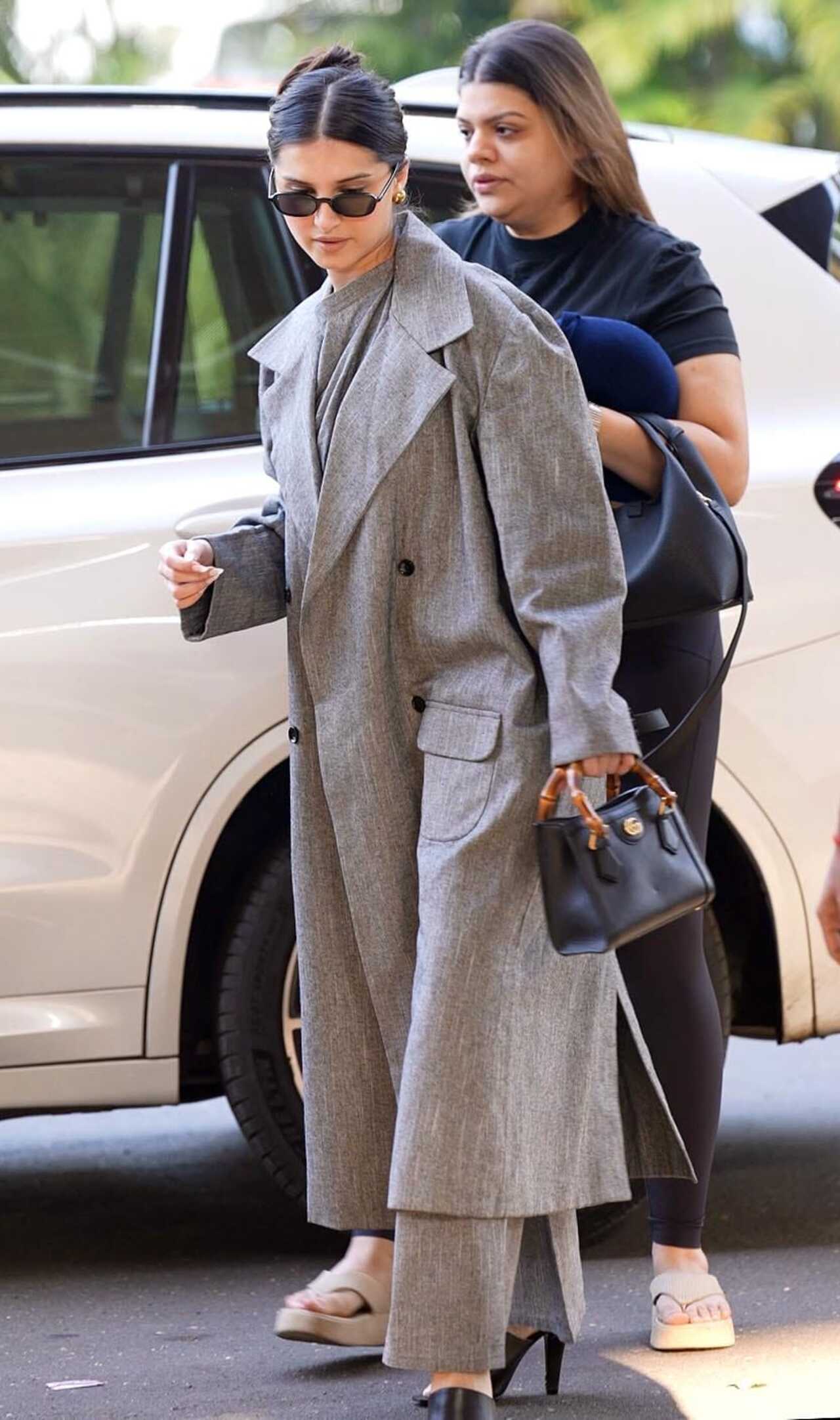 

Tara Sutaria was seen alone in public days after reports about her breakup with Veer Pahariya. She was spotted at the Mumbai airport in stylish gret attire and avoided interaction with paps.

